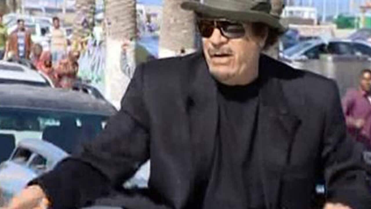gaddafi_touring_tripoli_b_110415_aap_1011445700