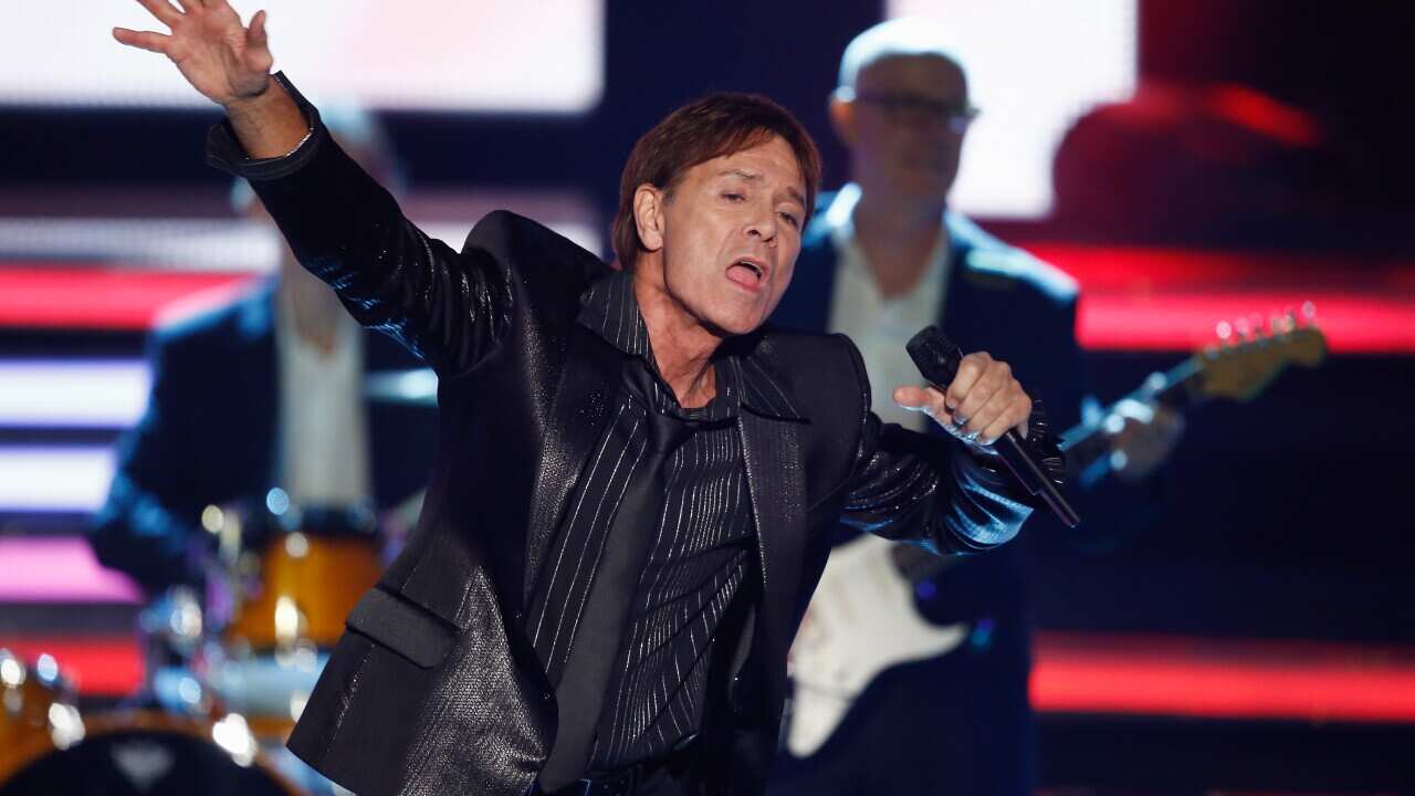 Cliff Richard performs during the 'Willkommen bei Carmen Nebel' show at Volkswagen Halle on November 23, 2013 in Braunschweig, Germany. 
