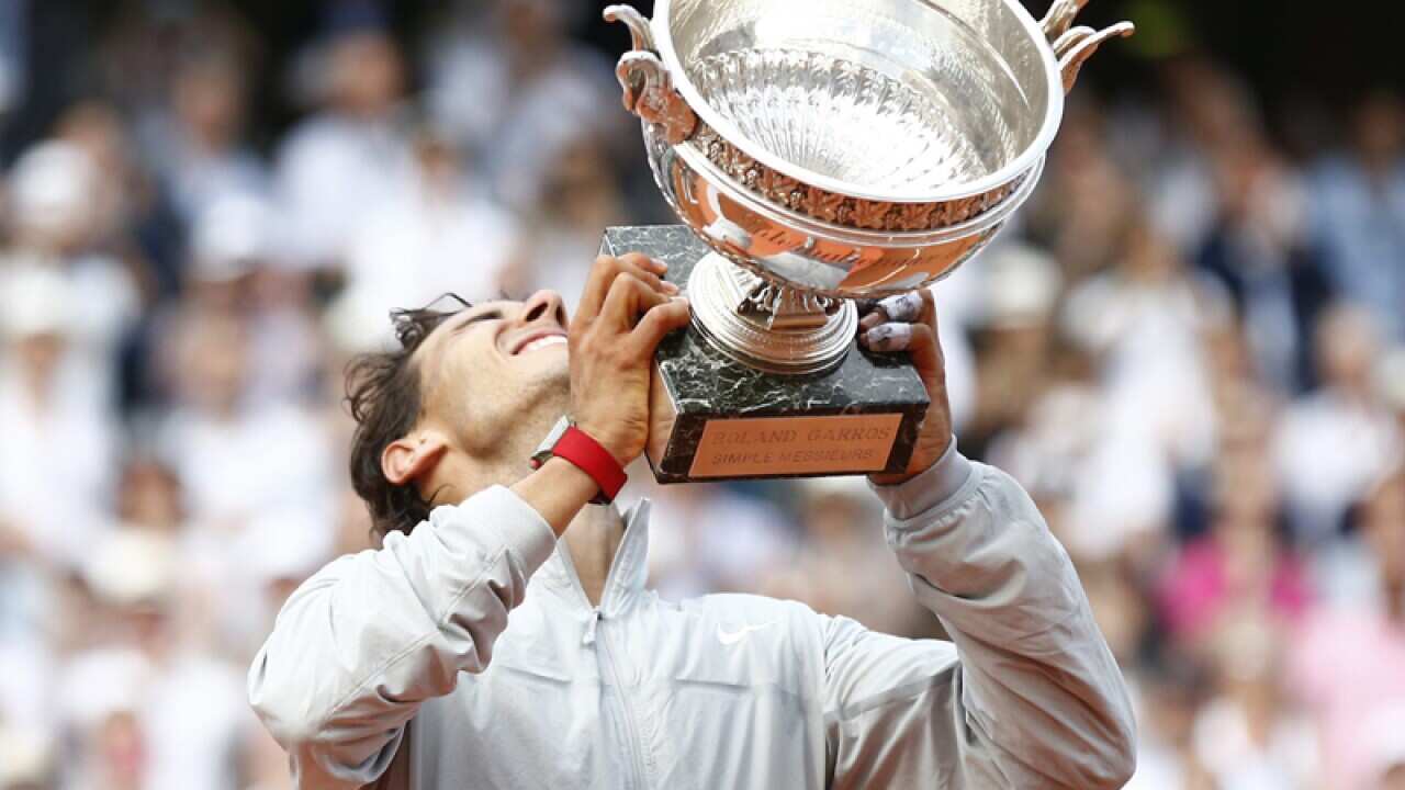 Rafael Nadal celebrates after winning the French Open