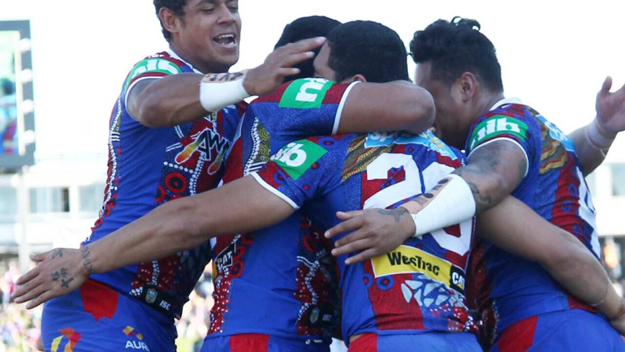Knights player celebrate