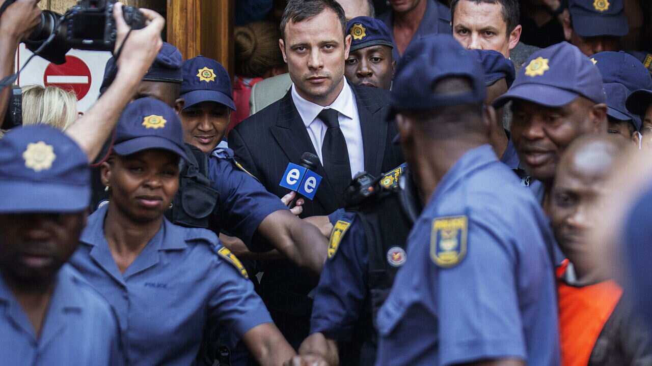 South African Paralympian athlete Oscar Pistorius leaves court
