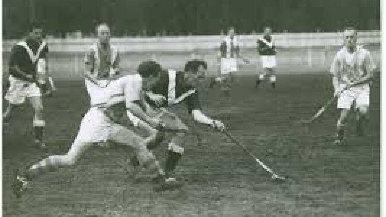 Vernon Turner (going for the ball) playing for Glebe against Mosman at Jubilee Oval, Glebe in the mid-50s.