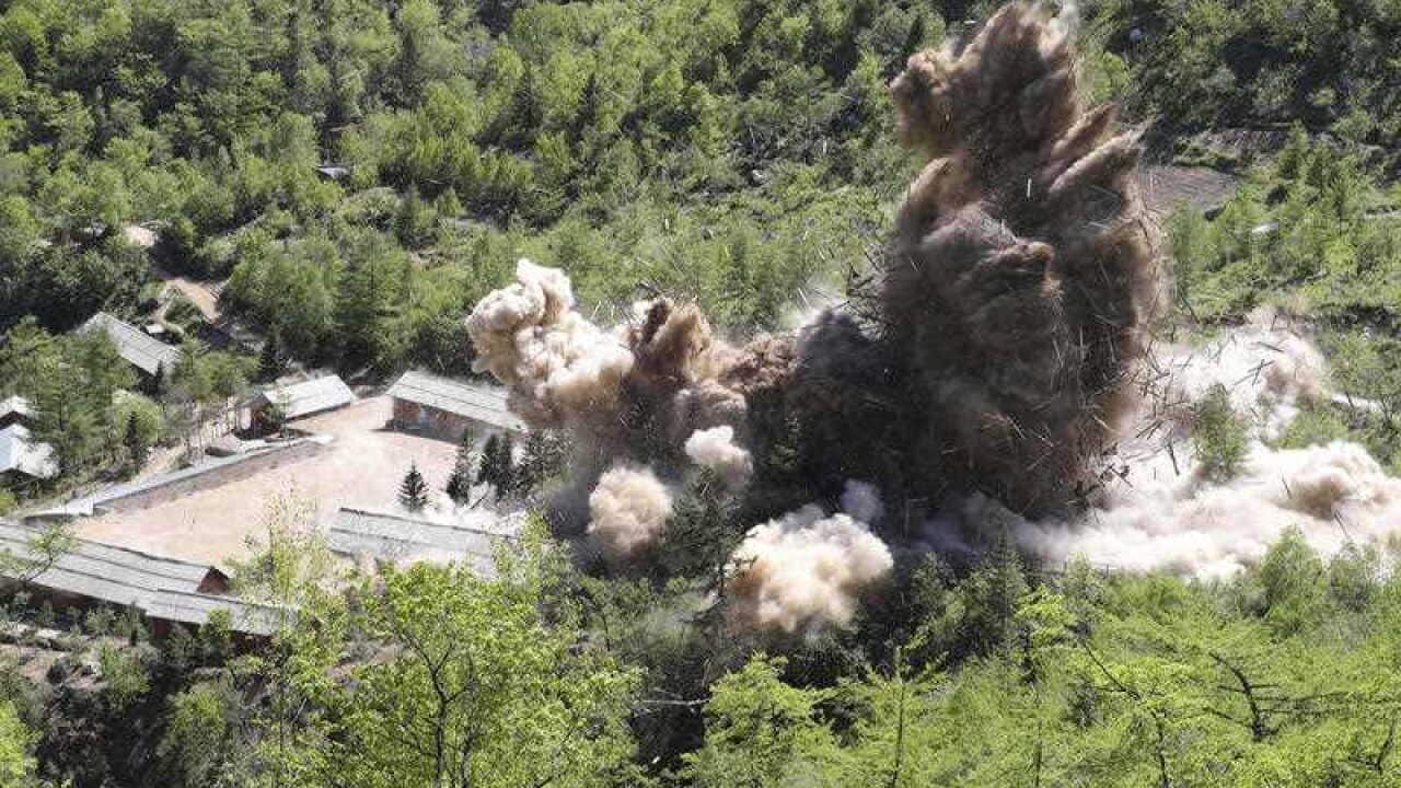 Command post facilities of North Korea's nuclear test site are exploded in Punggye-ri, North Korea on Thursday, May 24, 2018.