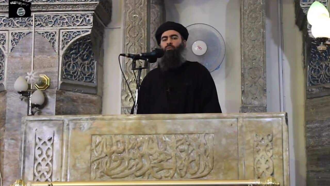 An image grab taken from a propaganda video released on July 5, 2014 by al-Furqan Media allegedly shows the leader of the Islamic State (IS) jihadist group, Abu Bakr al-Baghdadi (AAP)