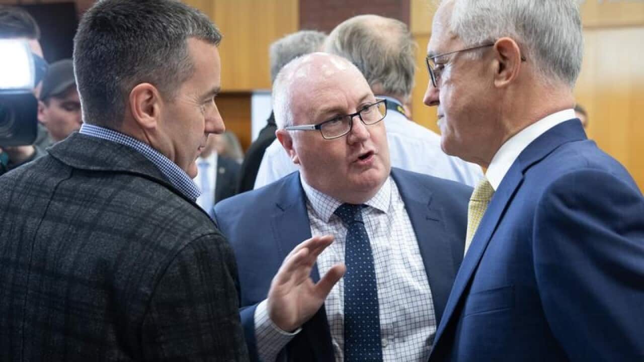 Braddon candidate Brett Whiteley speaks with Malcolm Turnbull.