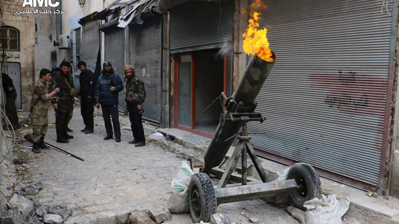 File photo of Syrian rebels firing locally made shells against the Syrian government forces, in Aleppo, Syria.
