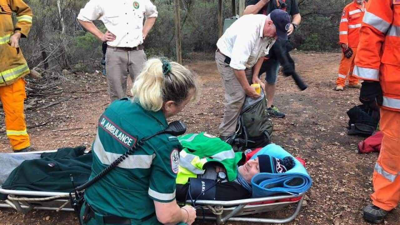 Jay Weatherill is treated by emergency services
