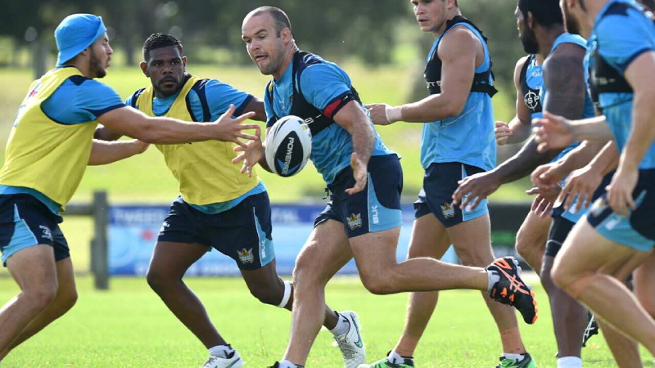 Gold Coast Titans skipper Nate Myles (C) during a training session