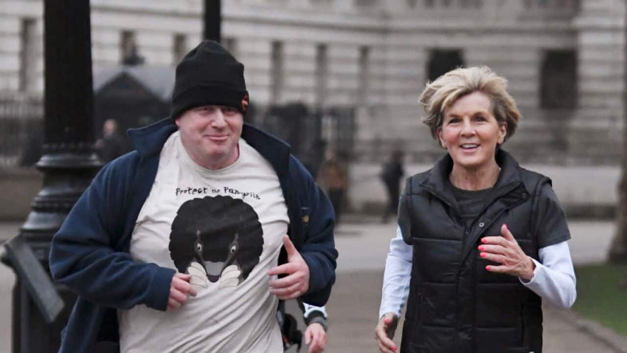 UK foreign minister Boris Johnson jogging with Australia foreign minister Julie Bishop in London.