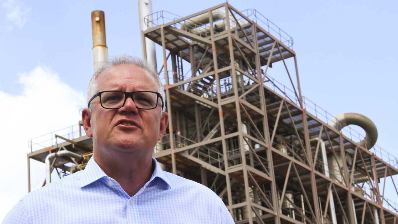 Australian Prime Minister Scott Morrison speaks to the media during a visit to Northern Oil Refinery in Gladstone, QLD, Thursday, January 21, 2021. (AAP Image/Lukas Coch) NO ARCHIVING
