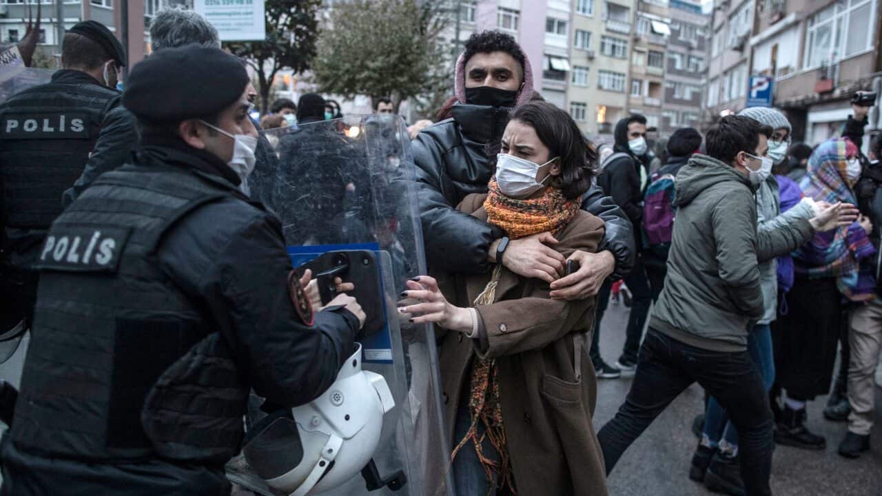Turkish police block women during a protest against Turkey's withdraw decision from Istanbul Convention in Istanbul, Turkey on 20 March 2021.