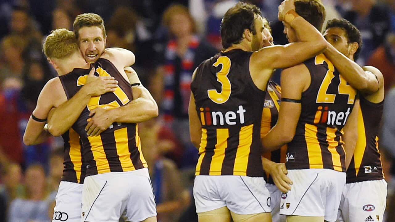 The Hawthorn Hawks celebrate their win