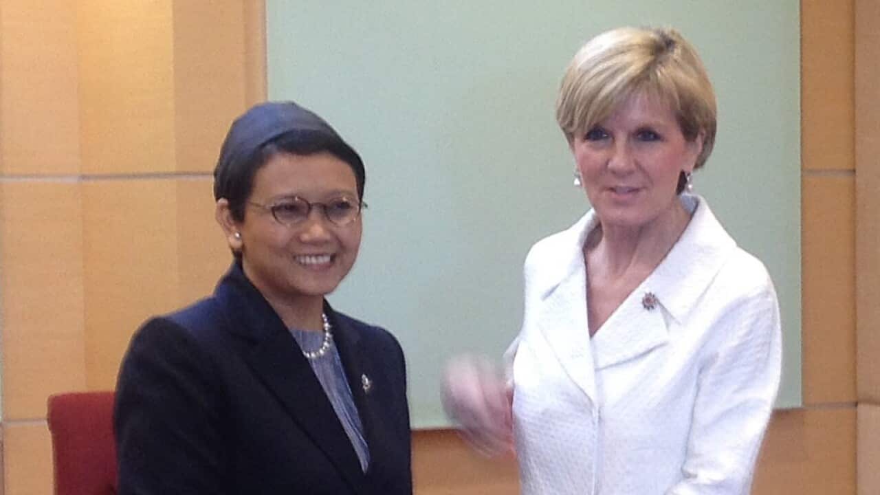 Indonesian Foreign Minister Retno Marsudi (left) meets with Australian Foreign Minister Julie Bishop at the ASEAN ministerial meetings in Kuala Lumpur, Malaysia, Wednesday, Aug. 5, 2015. (AAP Image/Gabrielle Dunlevy) NO ARCHIVING