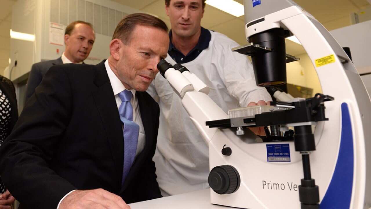 Tony Abbott during a tour of the Murdoch Children's Research Institute