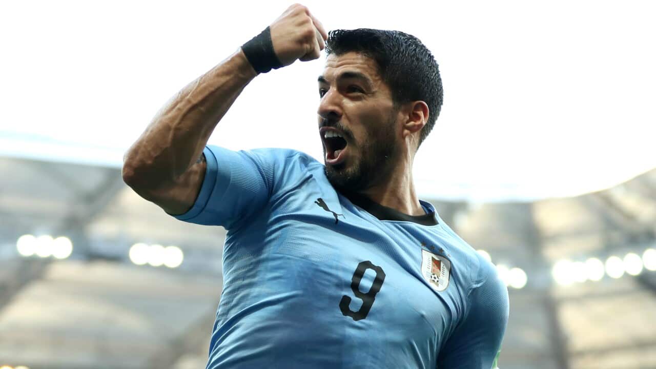 Luis Suarez scores for Uruguay in their match against Saudi Arabia