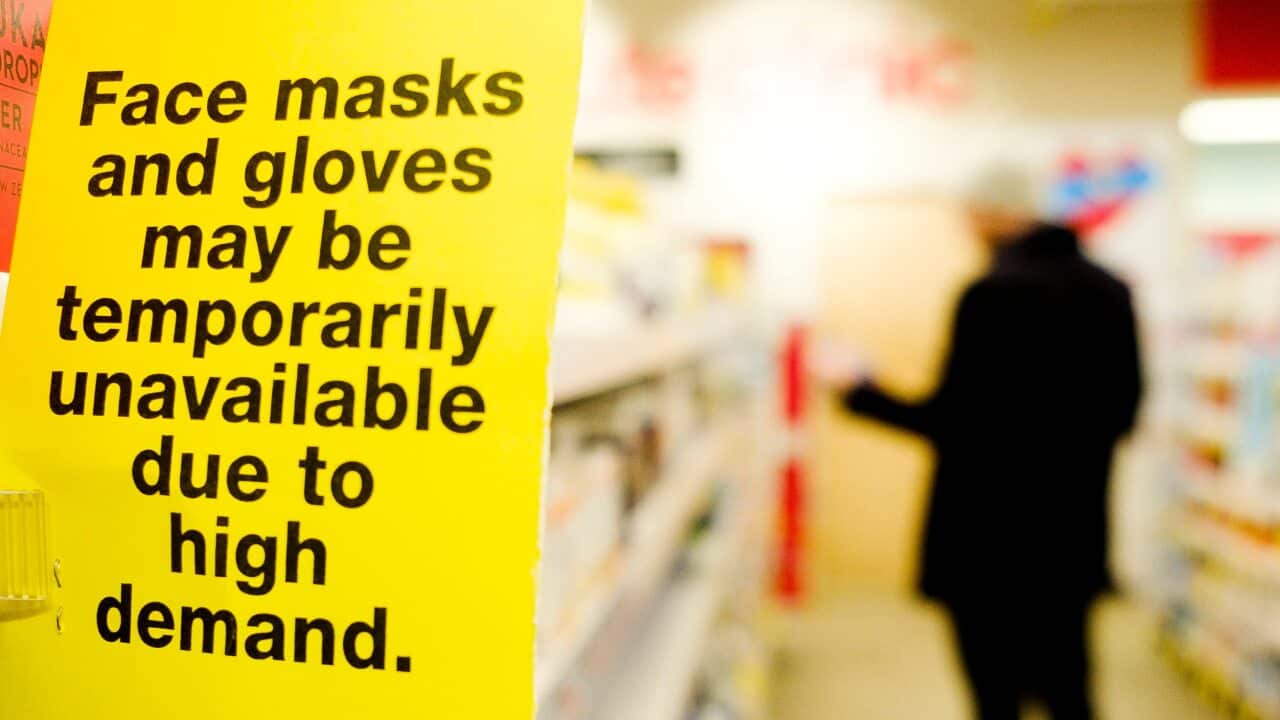epa08272995 A sign about the supply of face masks and gloves hangs at a pharmacy near Times Square in New York, New York, USA, 05 March 2020. There are reportedly 22 confirmed cases of the coronavirus in New York. EPA/JUSTIN LANE