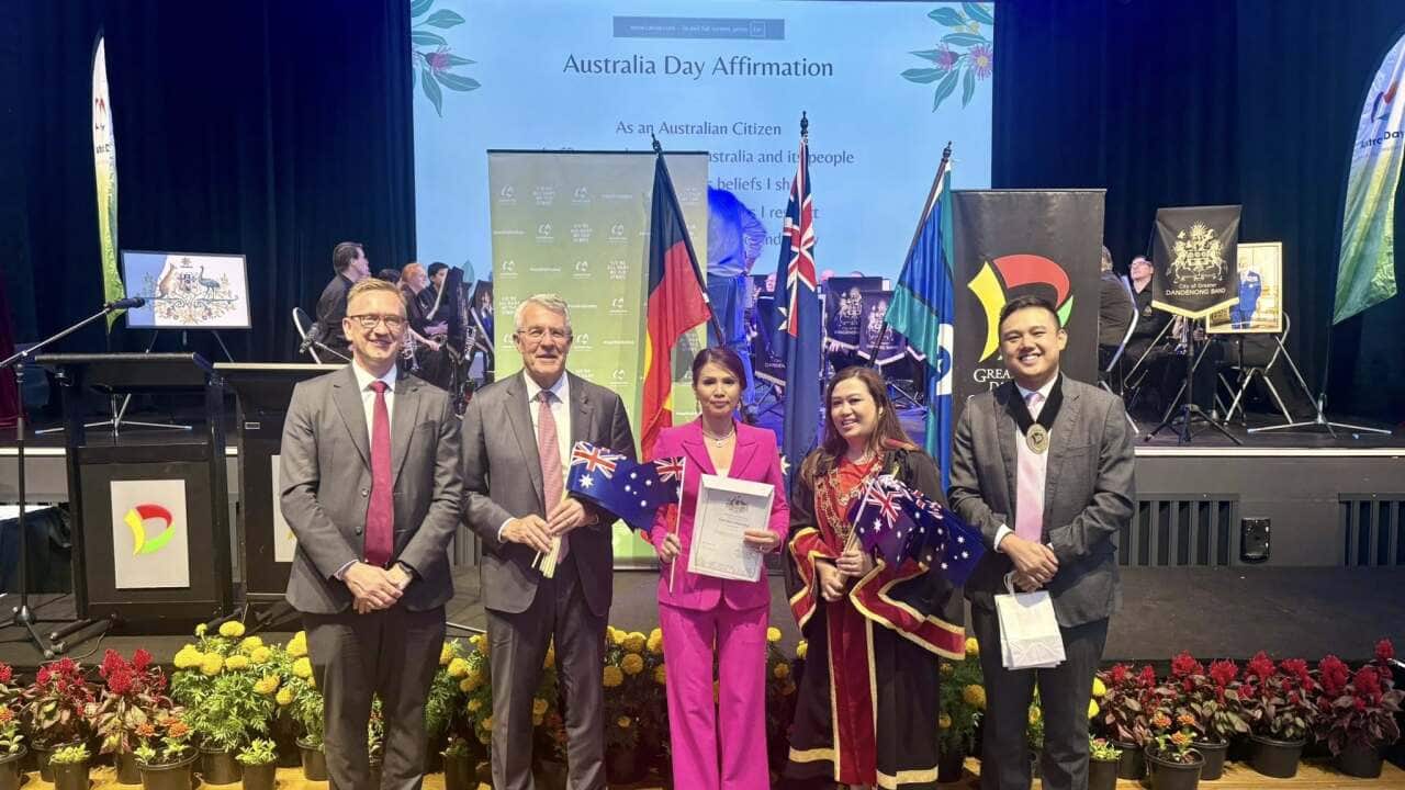 Kimlean Sey (middle) receives her citizenship on Australia Day.jpg