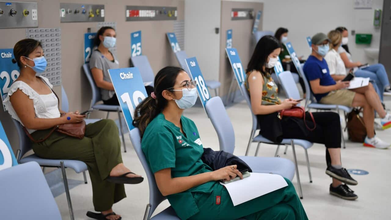 Health care workers wait in observation after receiving their COVID-19 vaccinations at the Westmead Hospital Vaccination Hub on March 1, 2021 in Sydney.