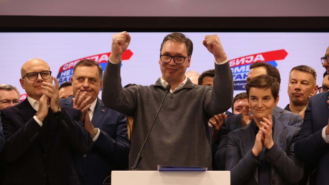 Serbian President Aleksandar Vucic (C) addresses the media after the Parliamentary and local elections in Serbia, 17 December 2023