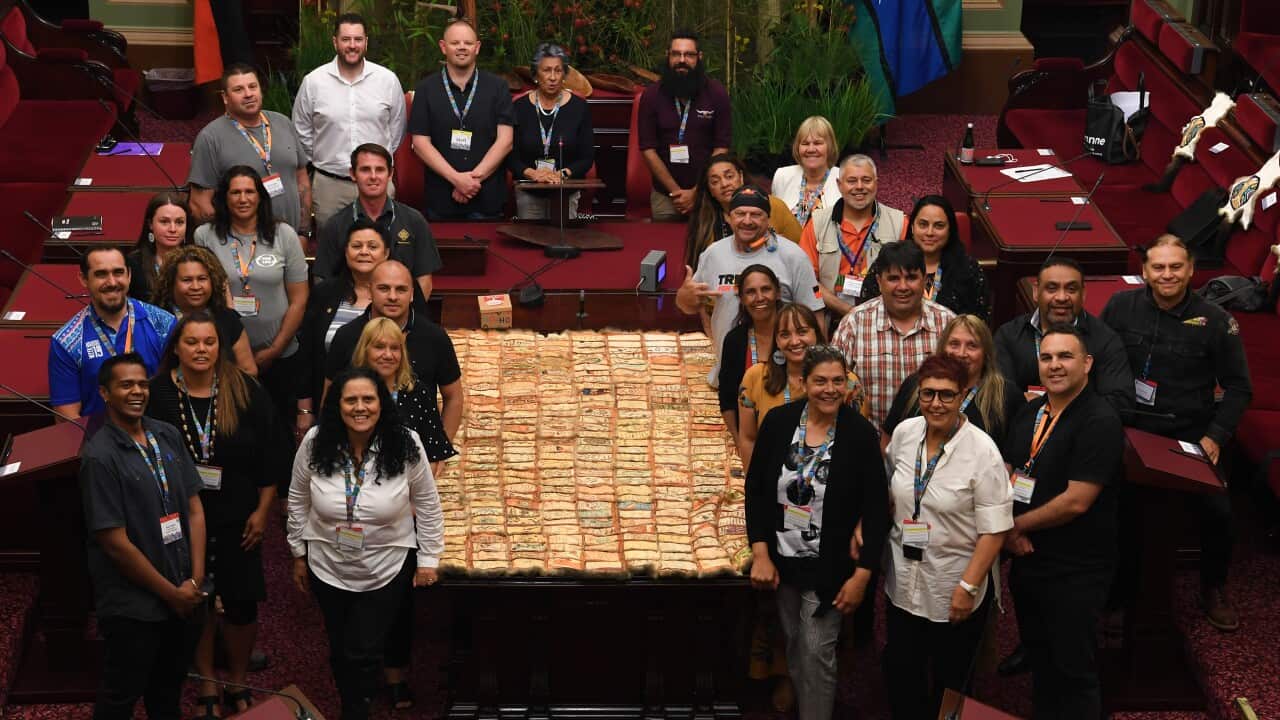 First Peoples' Assembly members pose for a photograph during the First Peoples' Assembly of Victoria inaugural meeting at The Parliament of Victoria in Melbourne, Monday, December 9, 2019. (AAP Image/James Ross) NO ARCHIVING