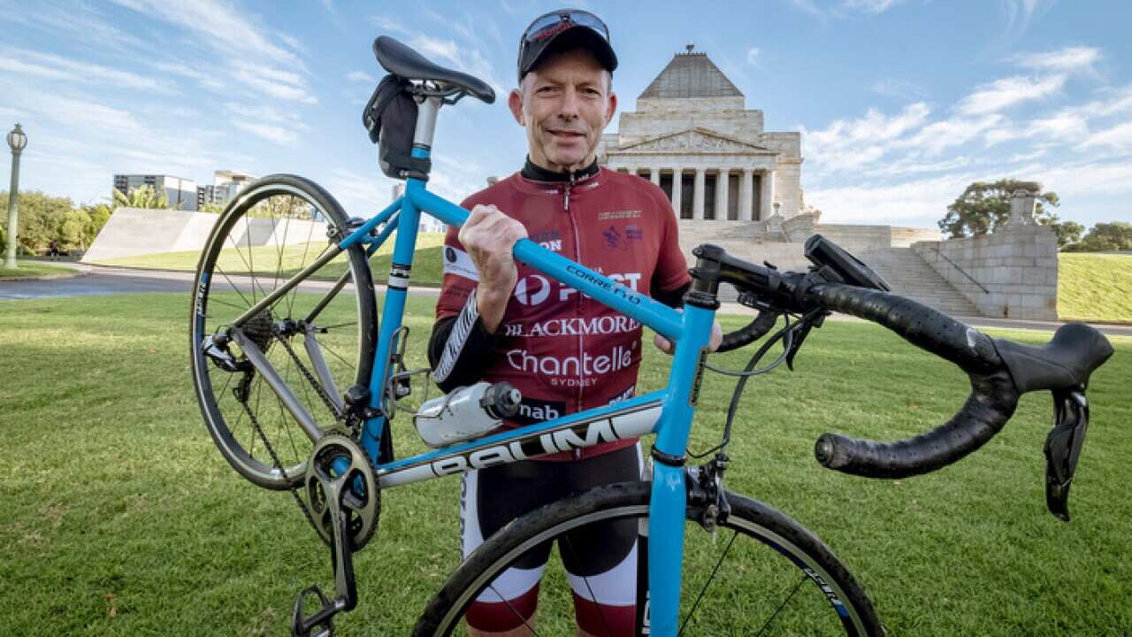 Former prime minister Tony Abbott takes part in the Pollie Pedal Bike Ride, starting at the Shrine of Remembrance in Melbourne, Sunday April 8, 2018.