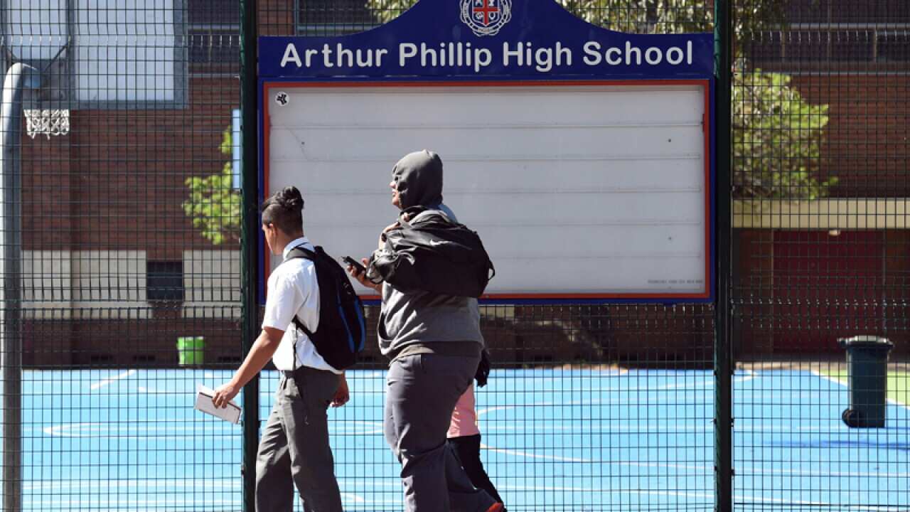 Students of Arthur Phillip High School depart from the grounds, Sydney