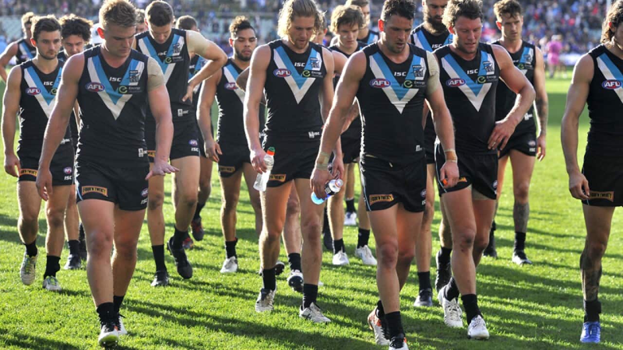 Dejected Port Adelaide players