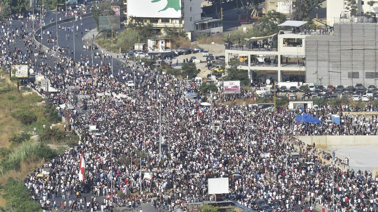 Lebanese people gather for the Beirut port explosion march on the anniversary