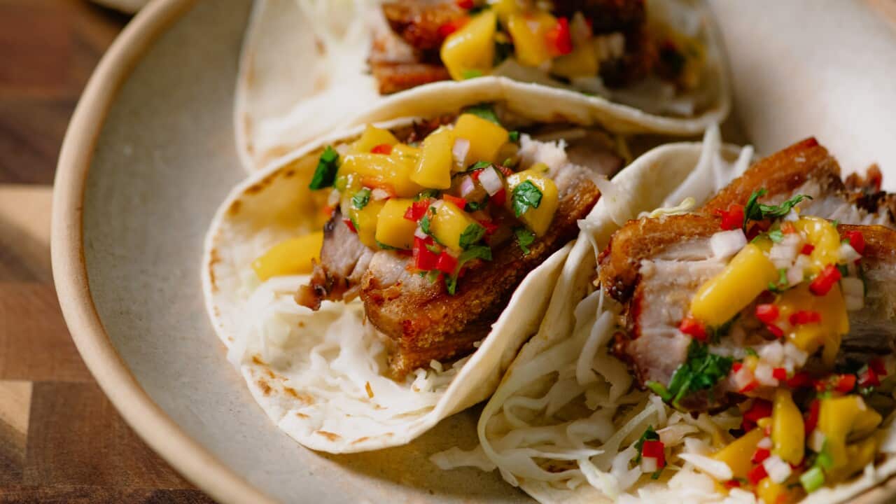 Crispy pork belly tacos with mango salsa