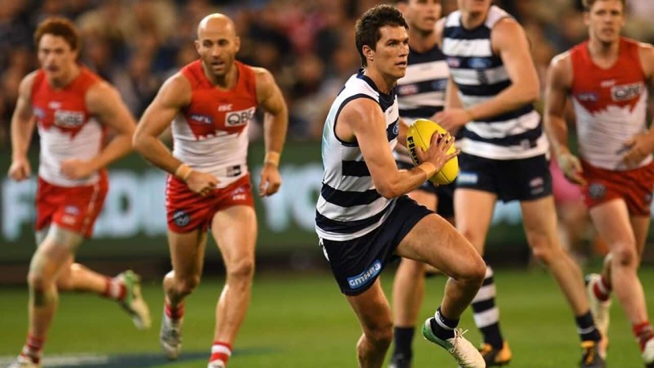 Andrew Mackie of the Cats