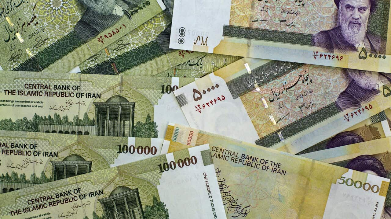 A picture taken on April 11, 2011 shows Iran's biggest denomination currencies, 100000 Rials and 50000 Rials in Tehran. (BEHROUZ MEHRI/AFP/GettyImages)