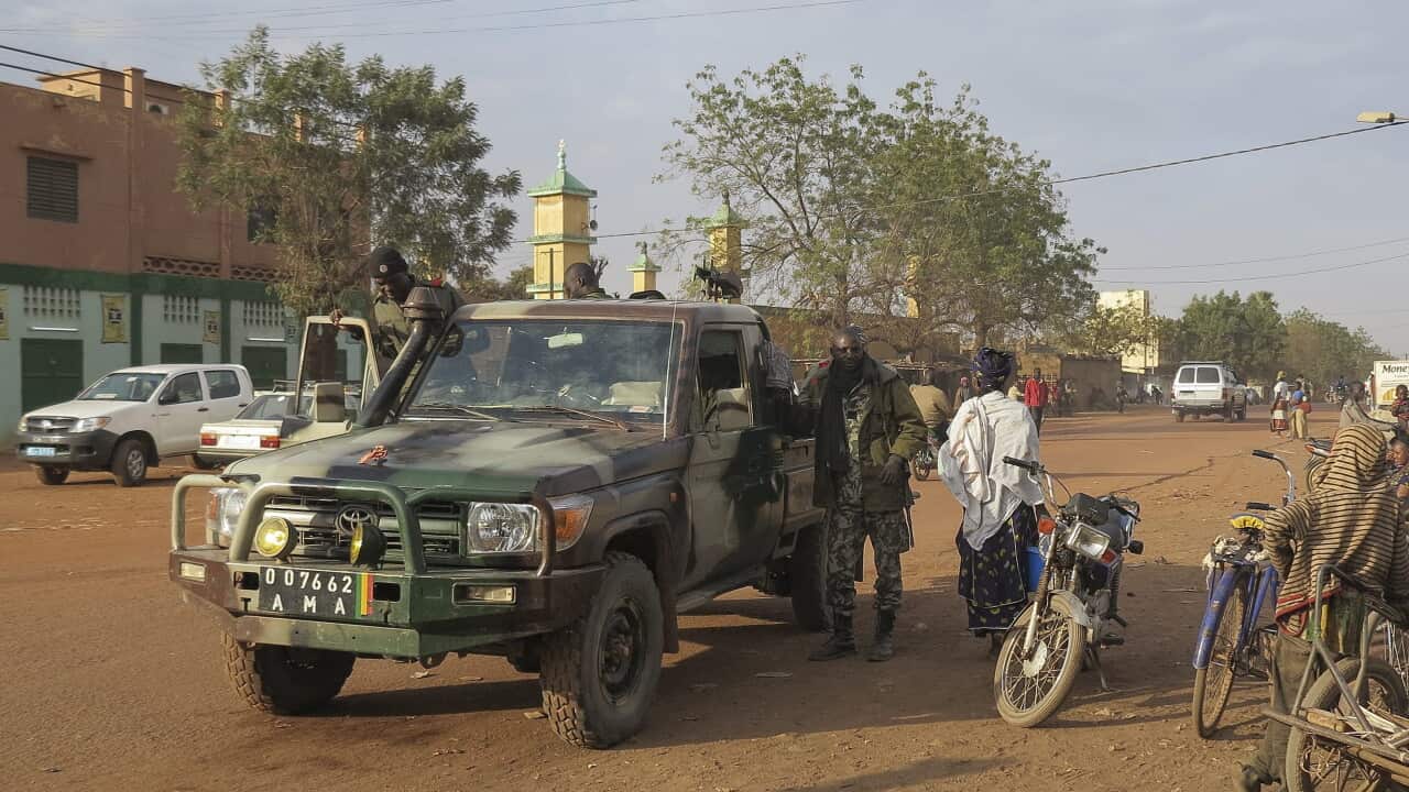 Malian forces patrolling through the northern town of Sevare, Mali. Unknown rebels launched an attack on a key trading hub in northern Mali, laying siege to at least three hotels frequented by foreigners, army sources