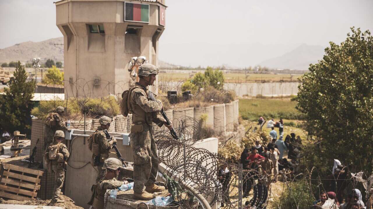US Marines during an evacuation at Hamid Karzai International Airport, Kabul, Afghanistan, 20 August 2021.