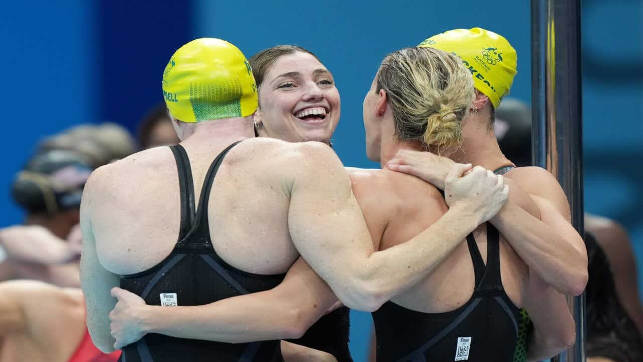 Australias 4 x 100m Womens freestyle team celebrate after winning the Gold Medal with a world record swim on Sunday, 25 July, 2021.