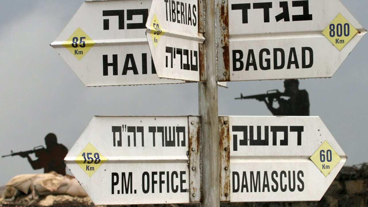 File photo of cutouts of soldiers behind sandbags on Mt. Bental on the Golan Heights.