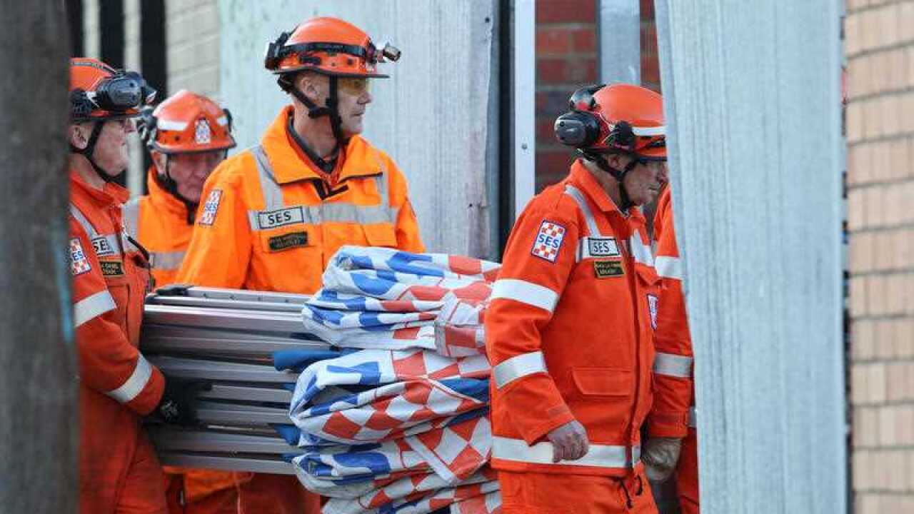 SES workers are seen at the scene where human remains were found at a storage facility in Oakleigh South, Melbourne