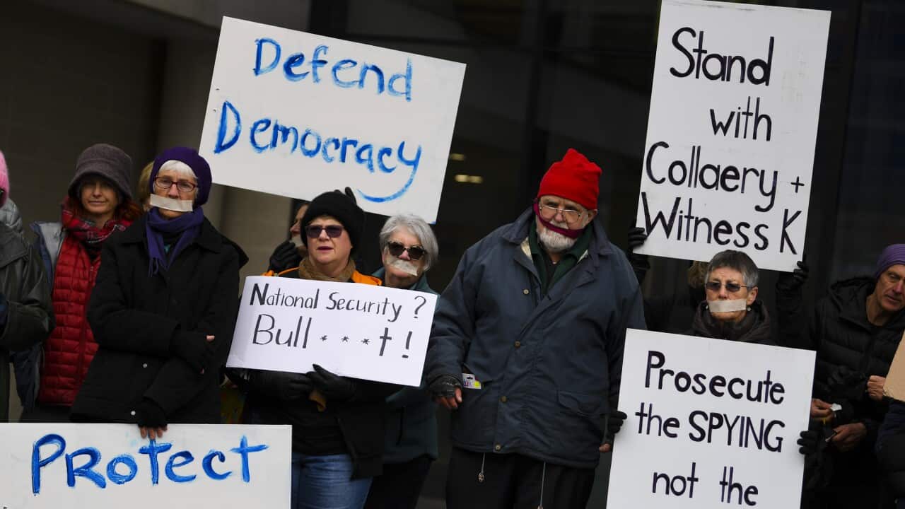 Supporters of lawyer Bernard Collaery and 'Witness K' stage a protest outside the Supreme Court in Canberra.