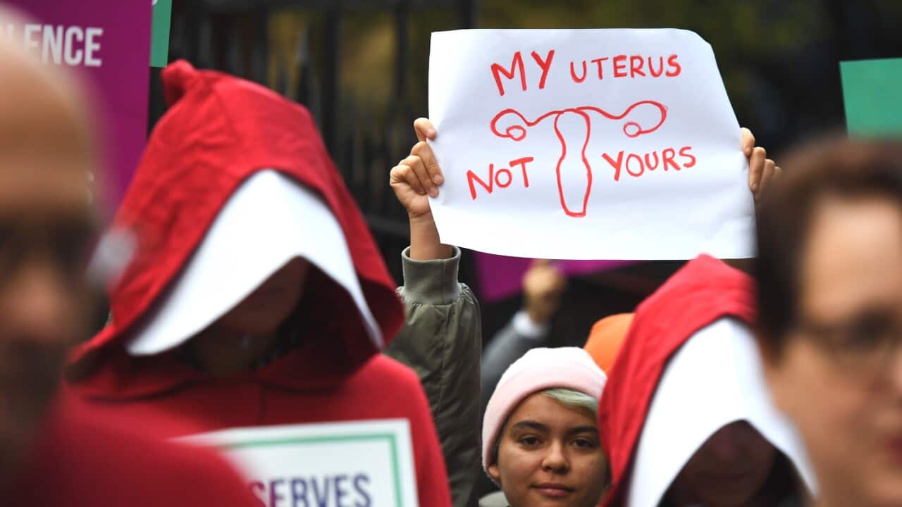 Supporters of creating a safe access zone around abortion clinics in NSW gather outside NSW Parliament House in Sydney