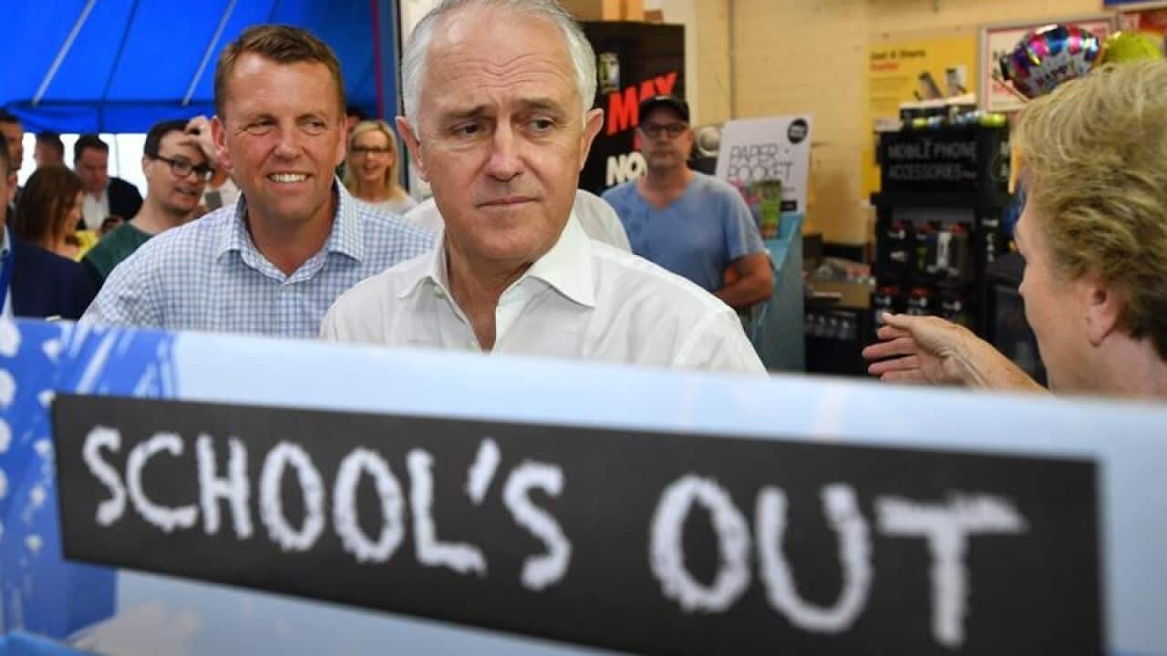 Malcolm Turnbull (r) during a street walk in Brisbane.