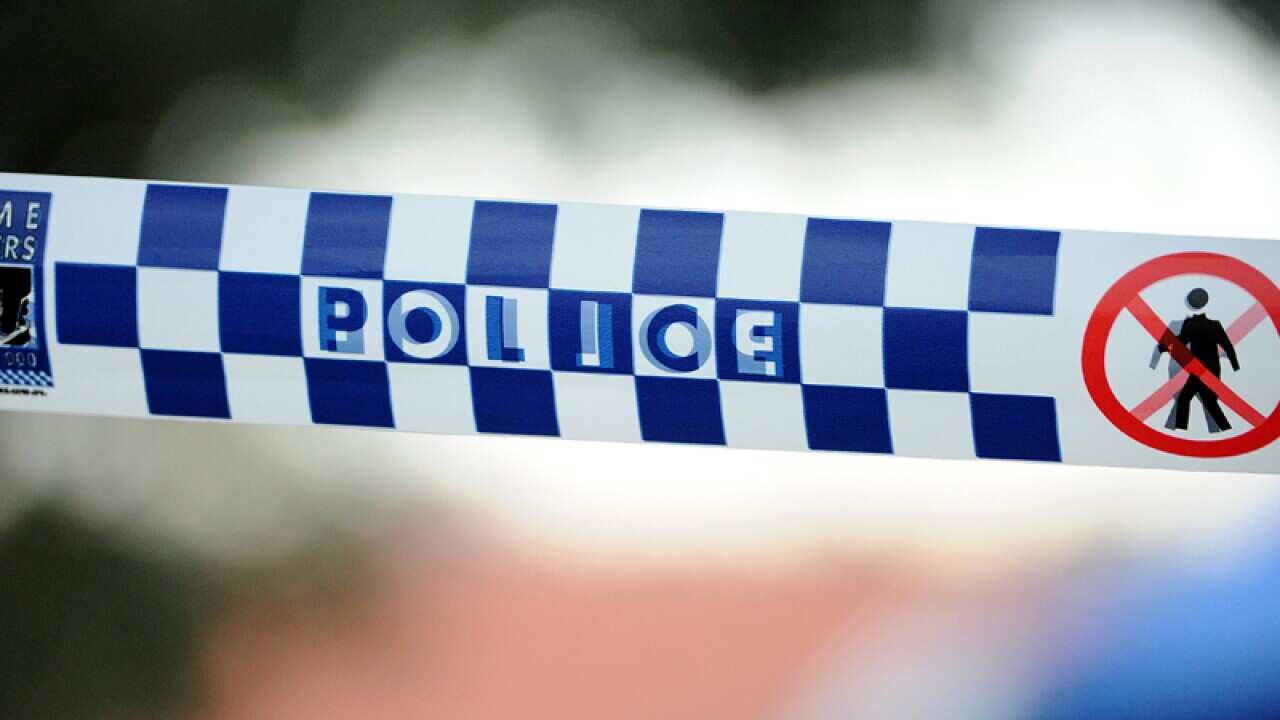 Police tape outside a home in Newcastle