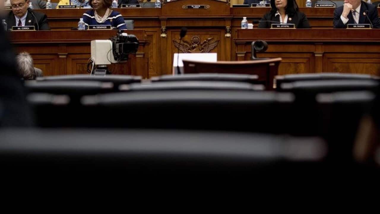 The witness chair reserved for AG William Barr sits empty