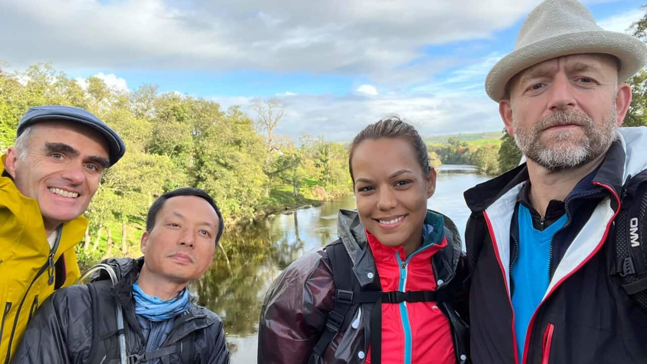Hung Nguyen with his companions on a 500-mile walking journey to Glasgow