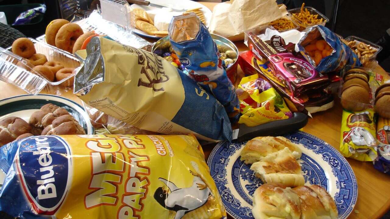 Plates pilling with food. What happens to the left overs.