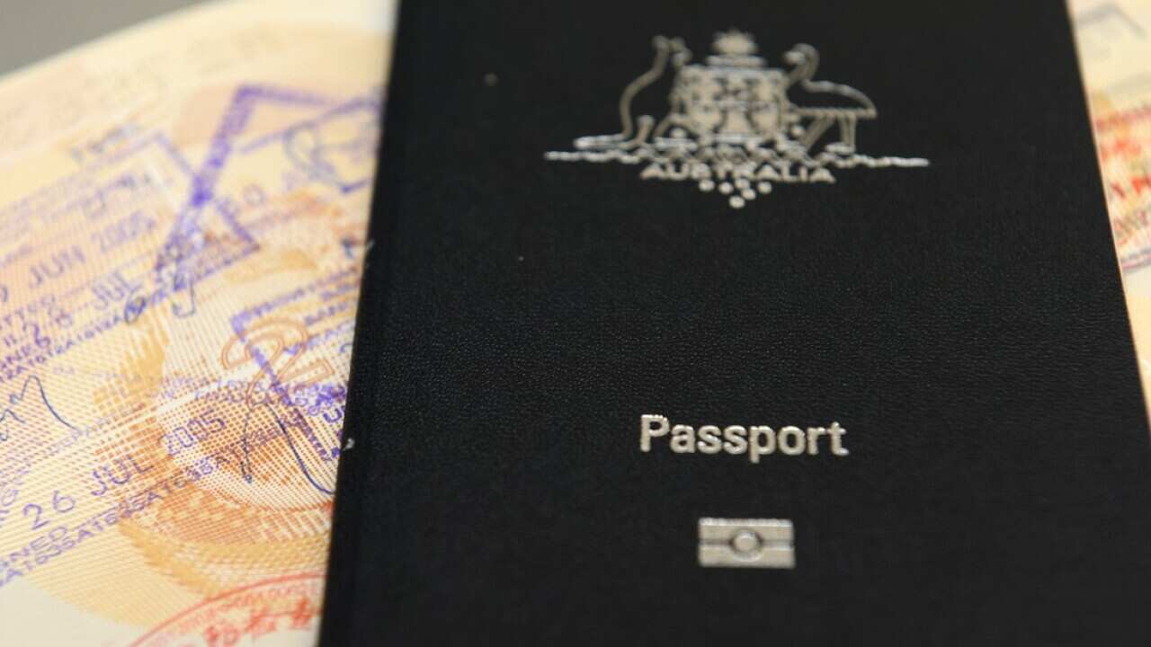 An Australian passport pictured in Brisbane, Thursday, July 25, 2013. (AAP Image/Dan Peled) NO ARCHIVING