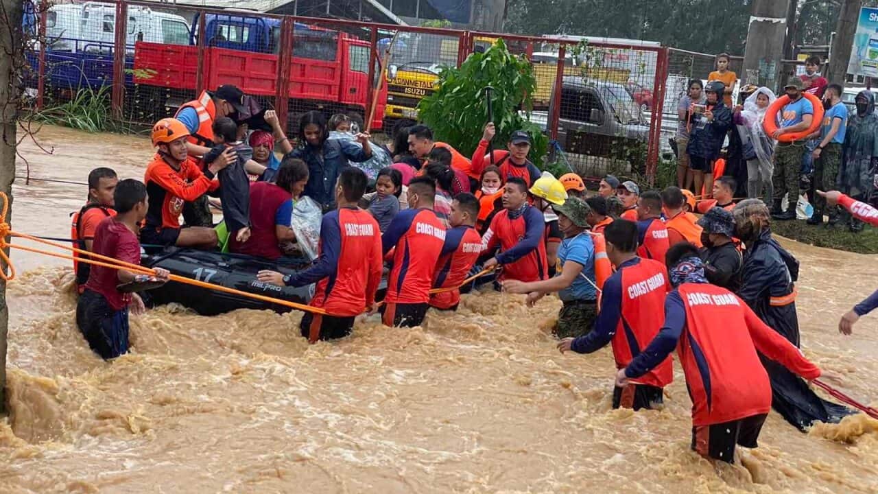 A rescue mission is carried out in the typhoon-hit city of Cagayan de Oro in the southern Philippines.