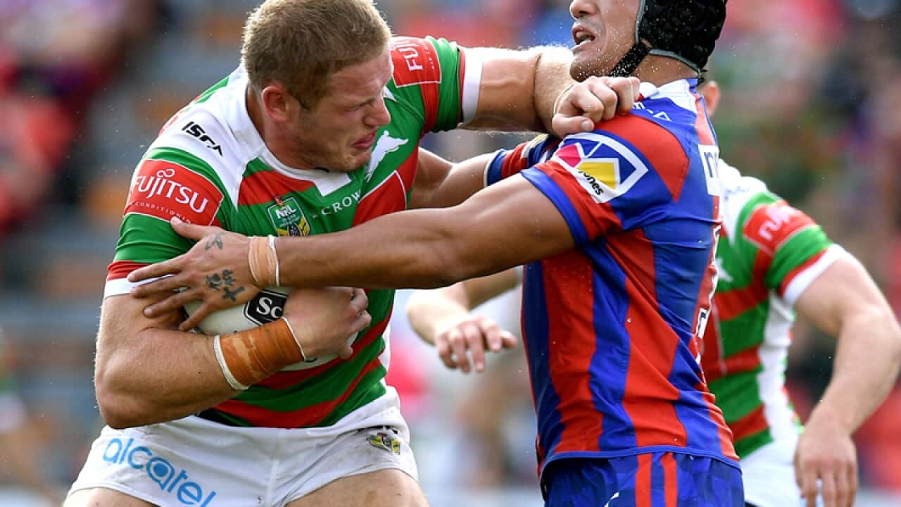 George Burgess of the Rabbitohs is tackled by Sione MataÕutia