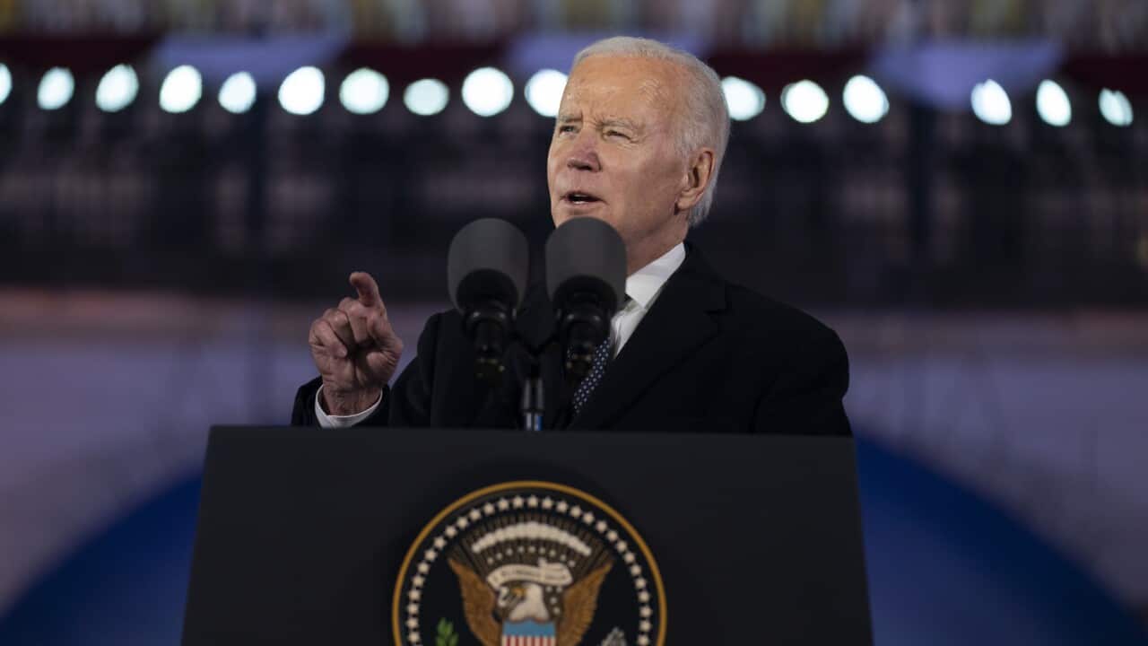 Biden standing at podium