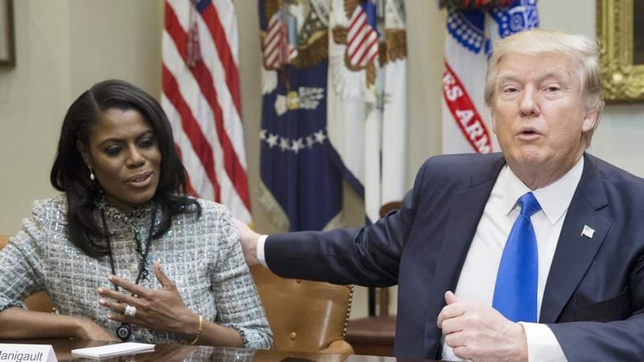 A file image of Omarosa Manigault Newman and President Trump