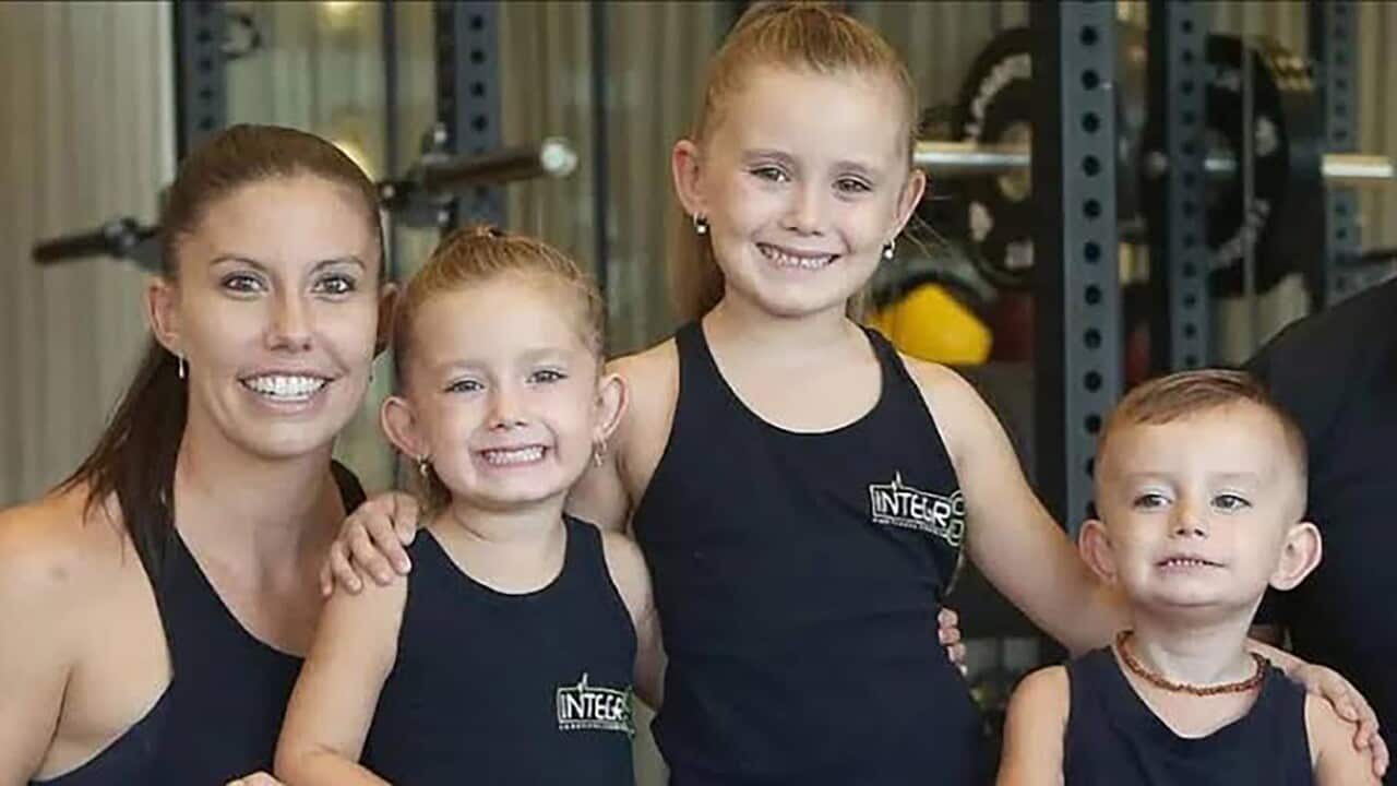 A woman and three children