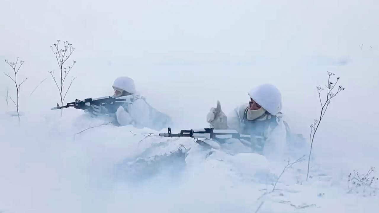 In this image taken from video and released by the Russian Defense Ministry Press Service, Russian soldiers attend military training.